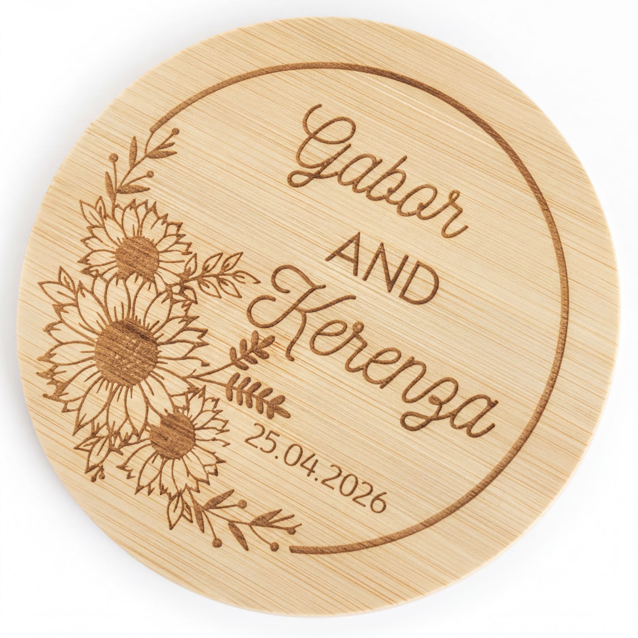 A wooden coaster with a floral design and text that reads "Gabor and Kerena" and "25.04.2026".