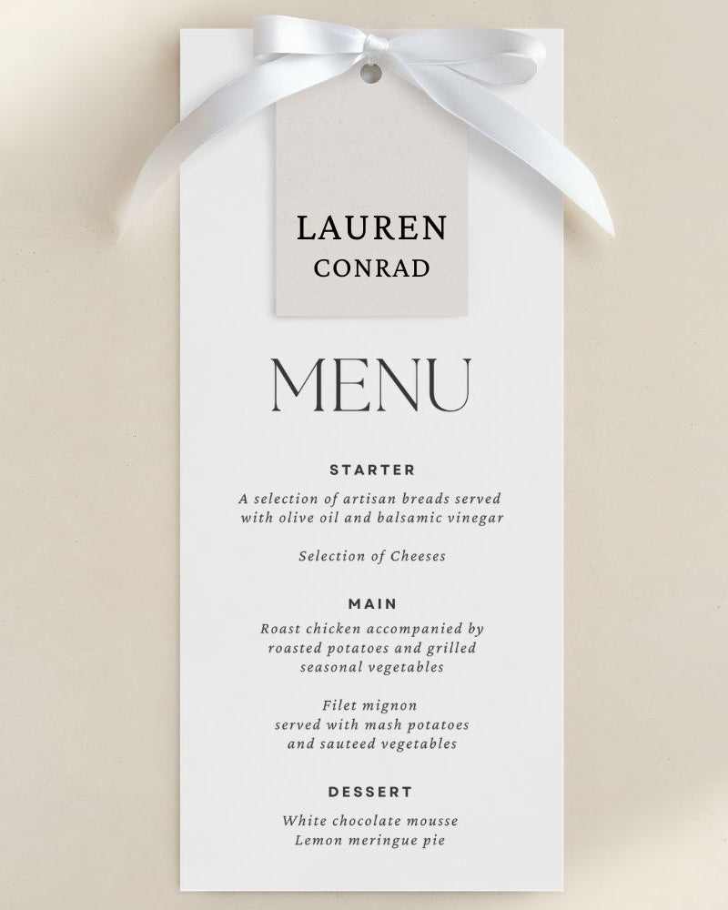 a menu card with a white ribbon and black text, featuring a selection of artisan breads served with olive oil and balsamic vinegar, and a selection of cheeses.