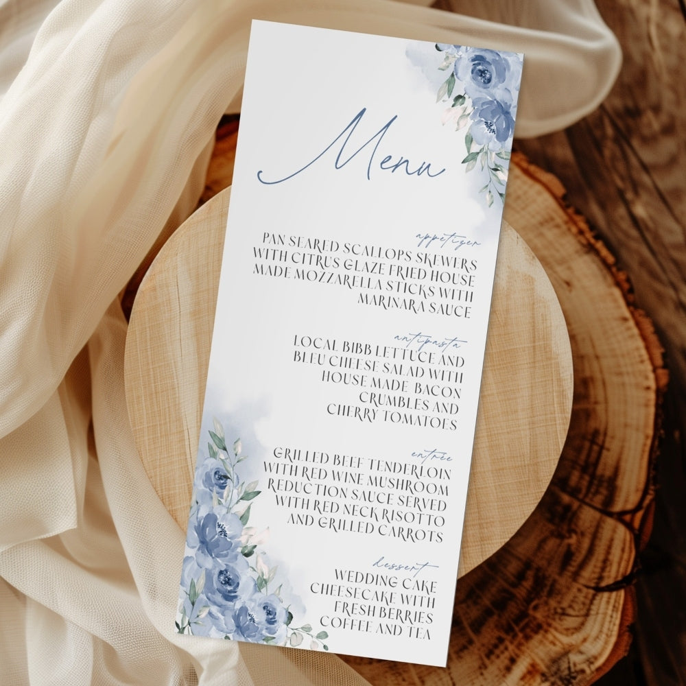 Menu card with blue floral design on a wooden surface