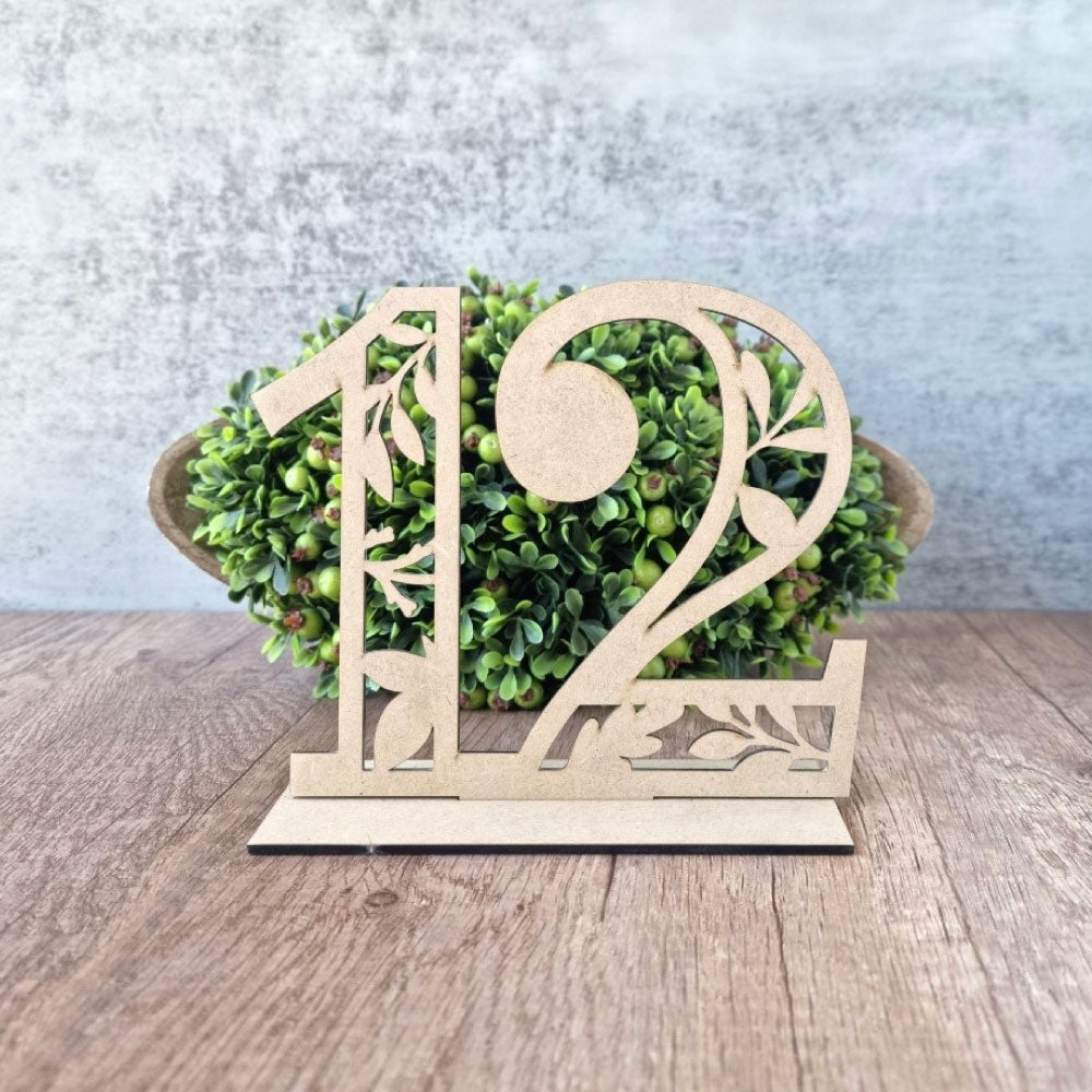 Numerical table number with intricate leaf design