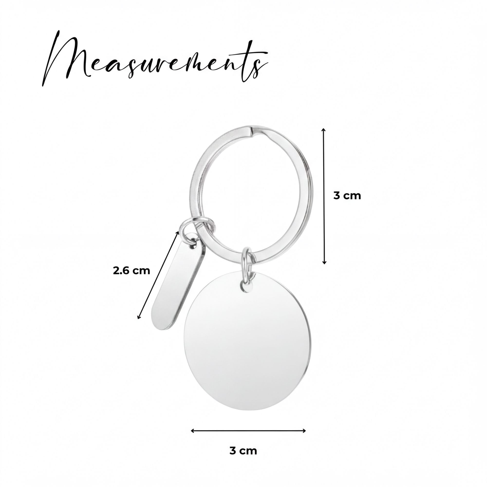 a silver keychain with measurements and a round tag attached to it.