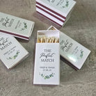 Matches boxes labelled 'The Perfect Match' with personalized text on a textured surface