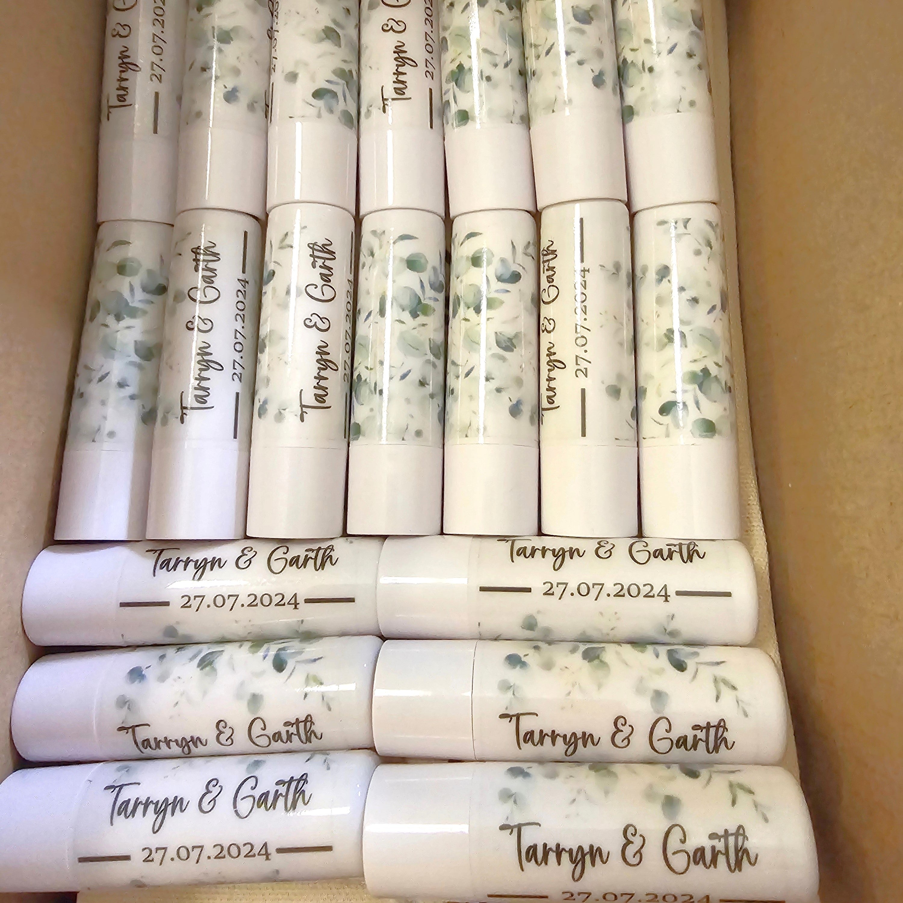 lip balm sticks with personalized text and date, for a wedding favour