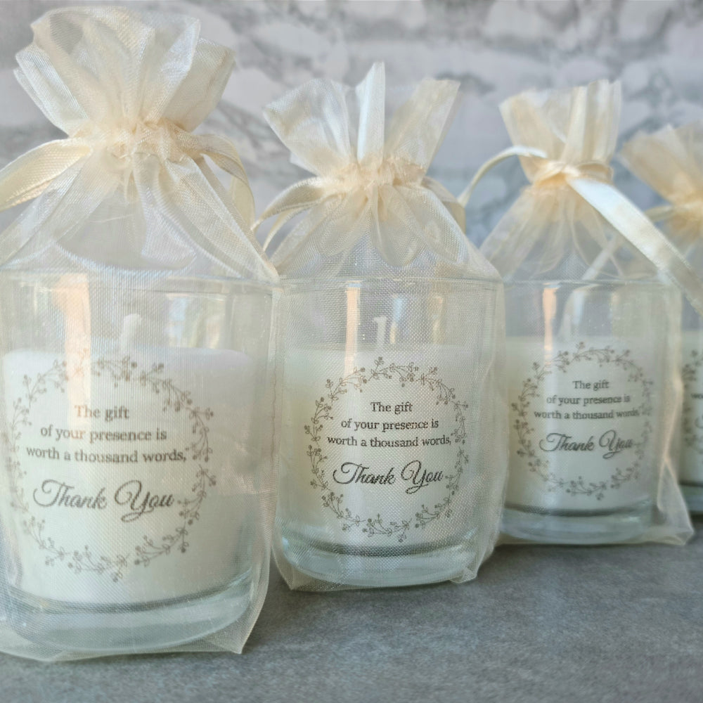 Personalised candle votives in an organza bag Simply Wedding Favours  cream