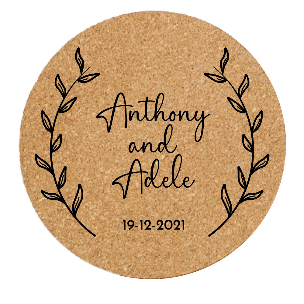 Design with leaf branches on round cork coasters with personalisation