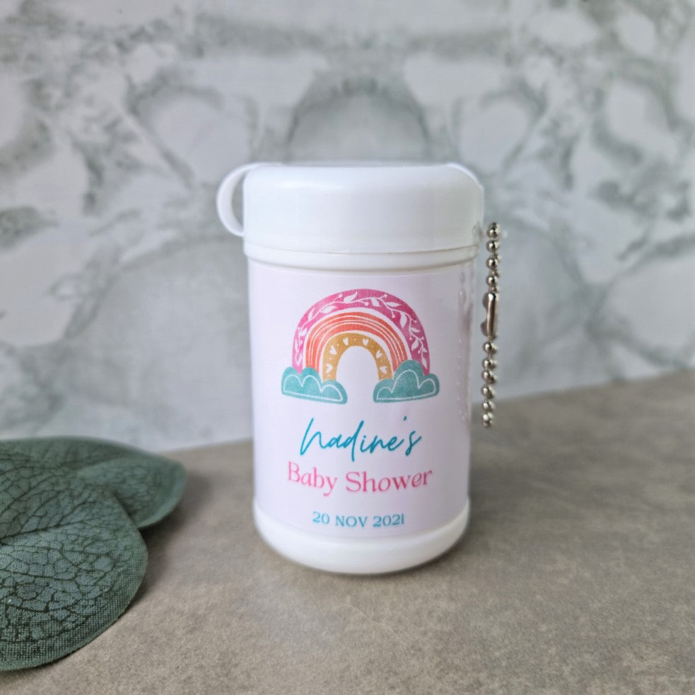Personalised wet wipes in travel size holder with whimsical rainbow and cloud design