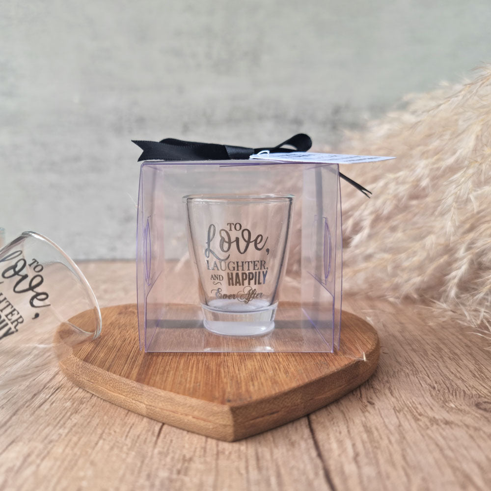 To Love, laughter and happily ever after shot glass in a clear gift box