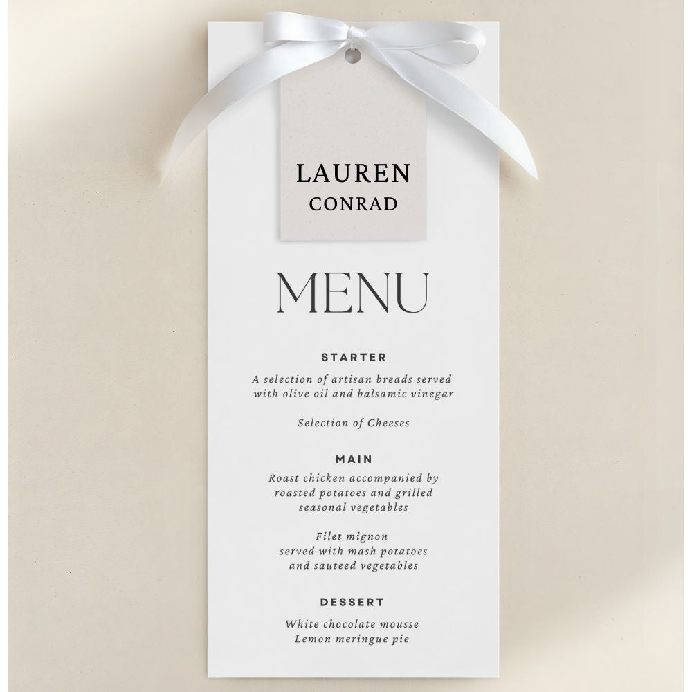 a menu card with a white ribbon and black text, featuring a selection of artisan breads served with olive oil and balsamic vinegar, and a selection of cheeses.