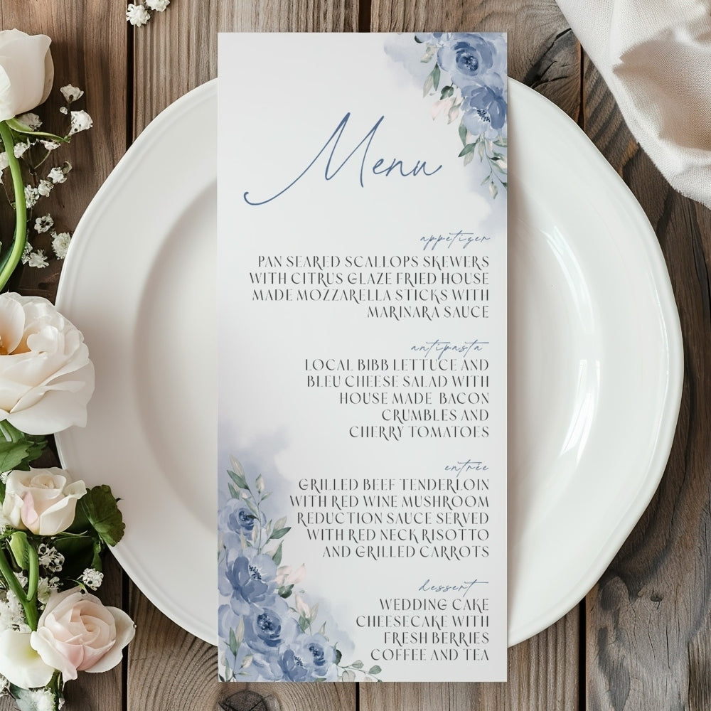 Menu card with floral design on a white plate with flowers on a wooden table