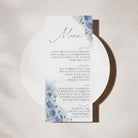 Menu card with blue floral design on a white background