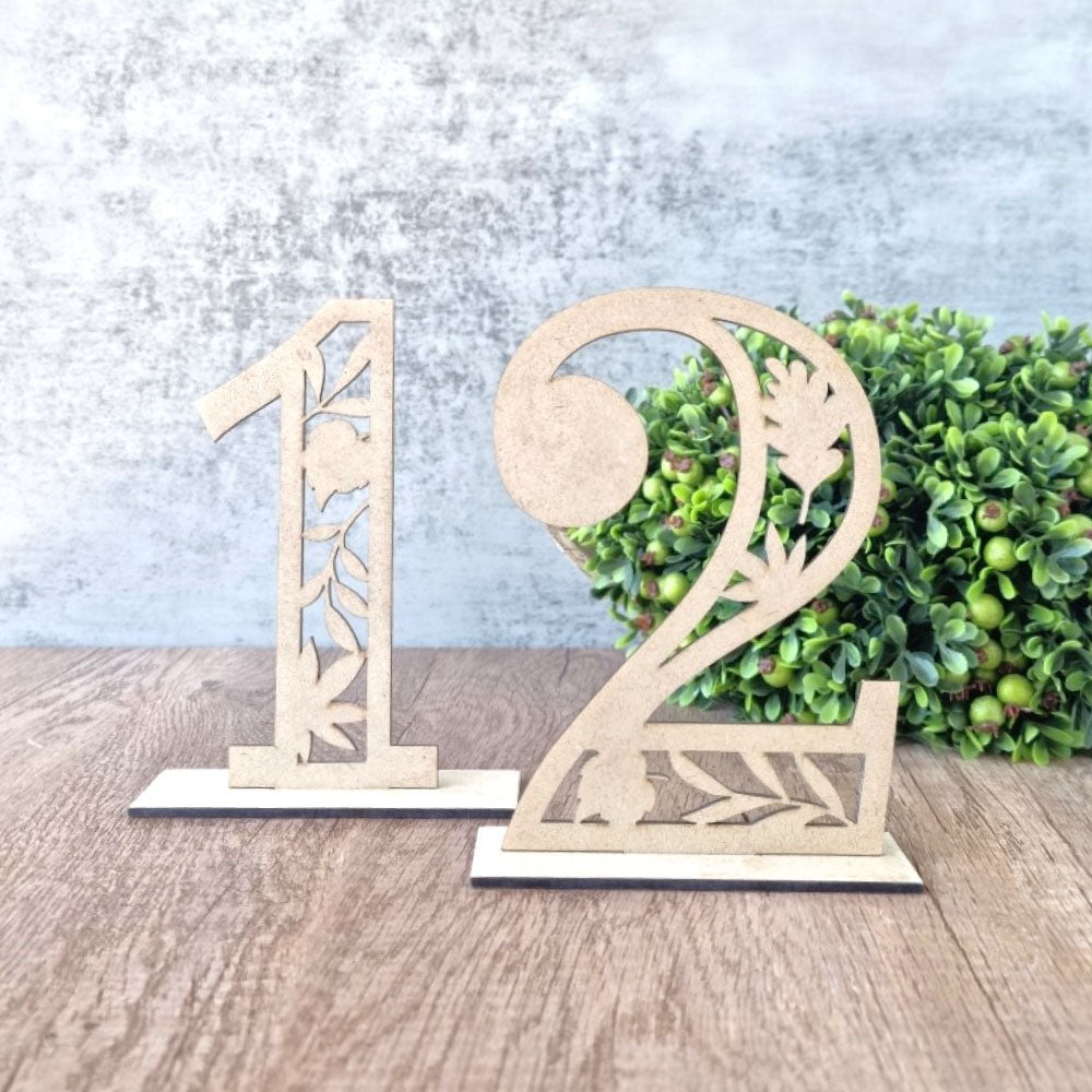 Numerical table number with intricate leaf design