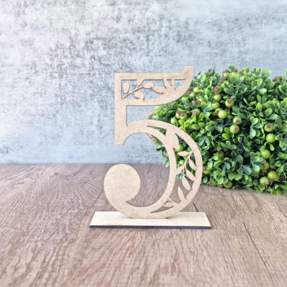 Numerical table number with intricate leaf design