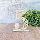 Numerical table number with intricate leaf design