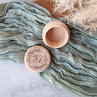 engraved round wooden ring box