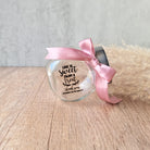 small glass candy jar with personalised sticker and ribbon