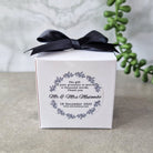 cube shaped favour box with ribbon and sticker