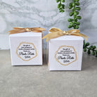 cube shaped favour box with ribbon and sticker