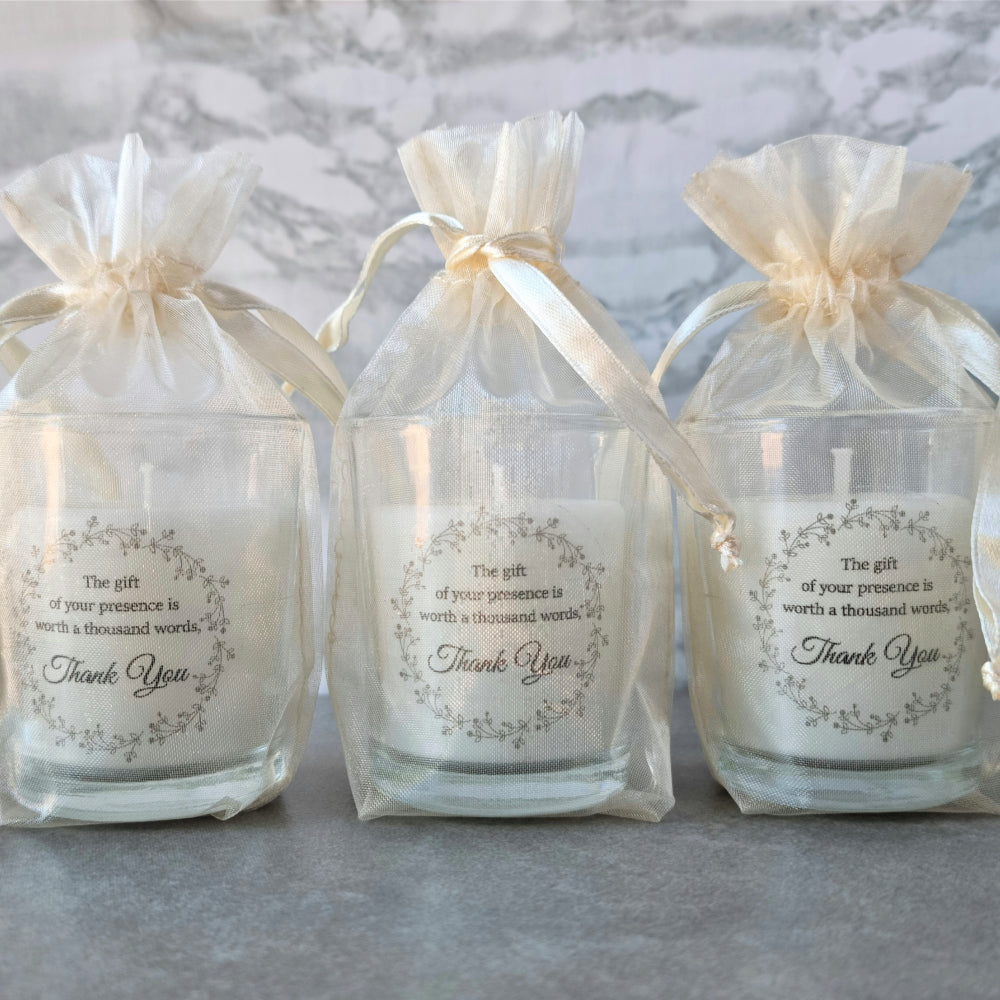 Personalised candle votives in an organza bag Simply Wedding Favours 