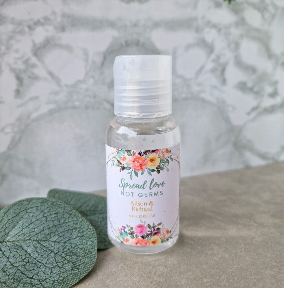 Floral design for mini hand santiser bottle with spread love not germs theme