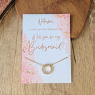 Bridesmaid friendship necklaces are presented on a small card that can be personalised