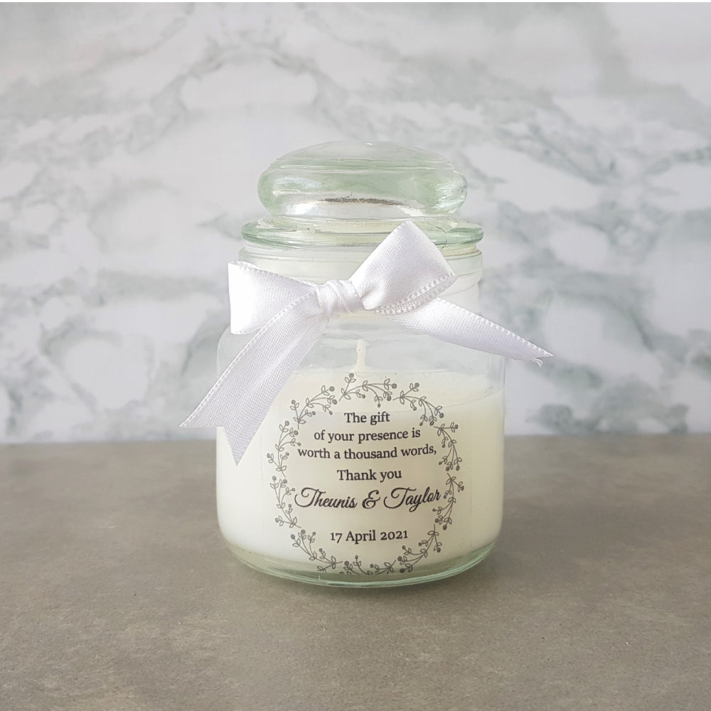 Candle in a miniature jar wedding favour