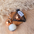 rose-gold-sphere-lip-balm-favour-in-organza-gift-bag