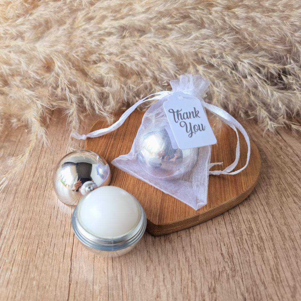 silver-sphere-lip-balm-favour-in-organza-gift-bag