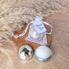 silver-sphere-lip-balm-favour-in-organza-gift-bag