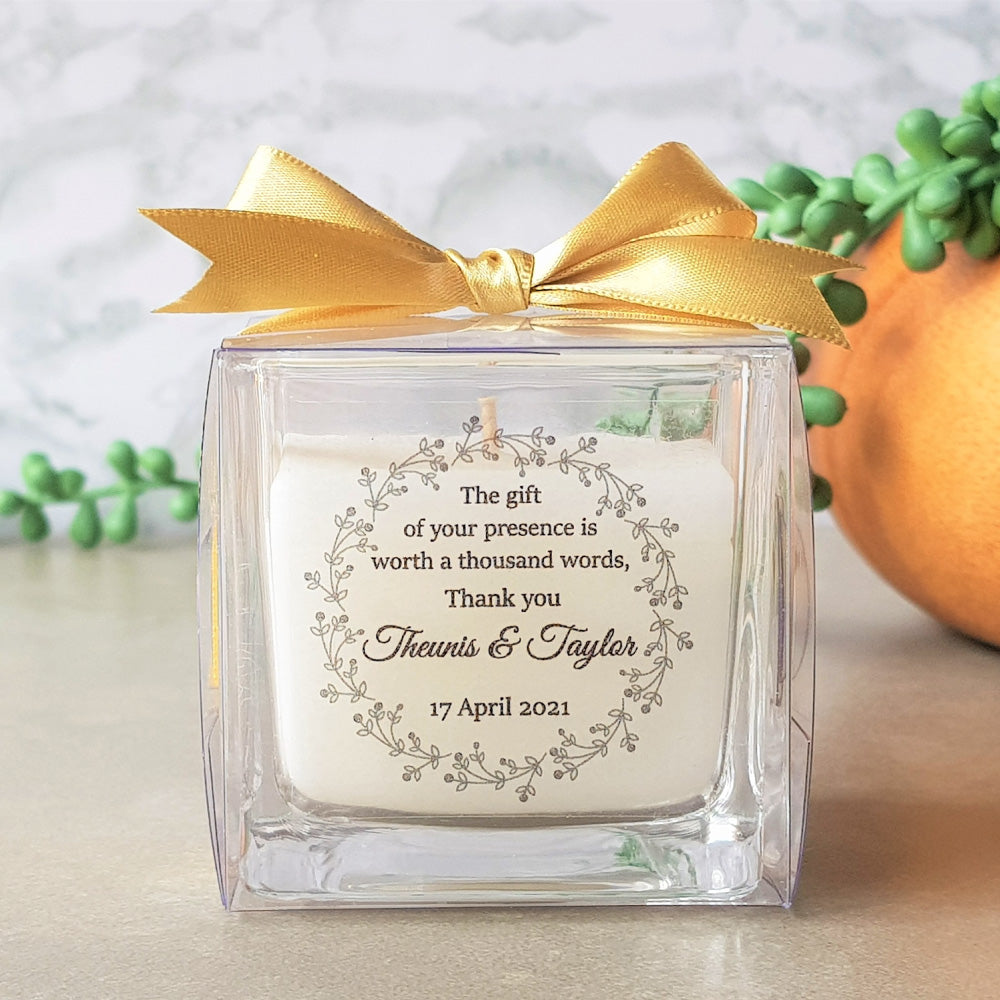 Square votive candle with gold ribbon and personalised sticker